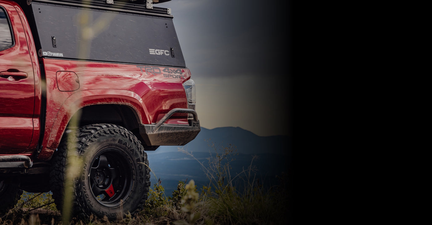 DRT Labor Day Sale desktop hero composite, red Tacoma blending to black